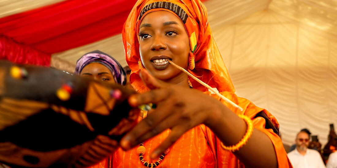 Photograph of event coverage in Dakar illustrating corporate social responsibility.