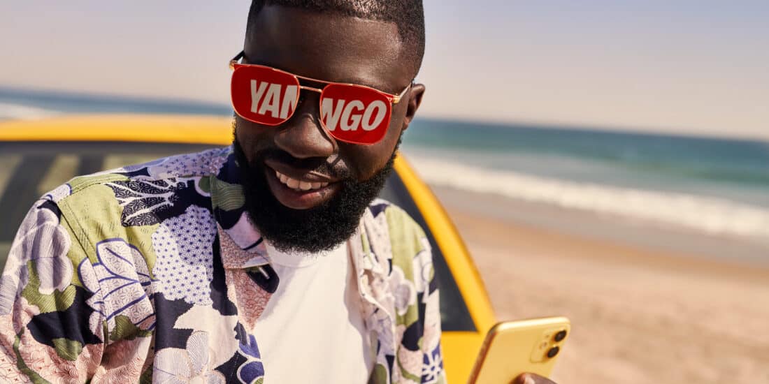 Male model fashion photography in sea side Dakar Senegal with glass reflector